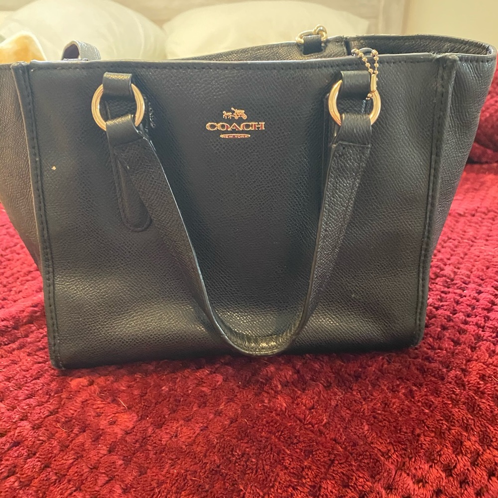 Two beautiful coach purses one black, one brown